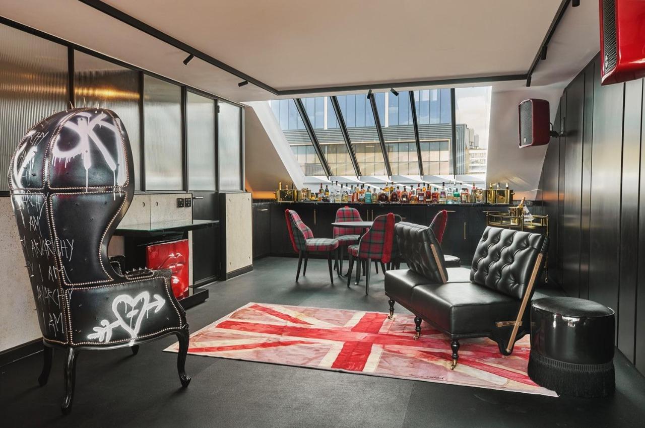 Chateau Denmark London Exterior foto The bar at the 100 Queen's Gate penthouse